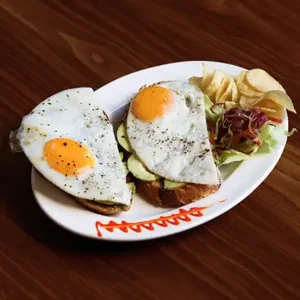 Pesto Avocado Egg Toast served hot and cold with fresh pesto and eggs on toasted bread