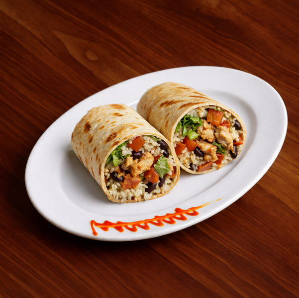Chipotle Mexican wrap with grilled chicken or falafel vegetables and chipotle sauce served fresh at Avayacafe