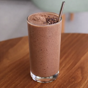 High protein chocolate smoothie with cacao, banana, milk and peanut butter at Avayacafe.